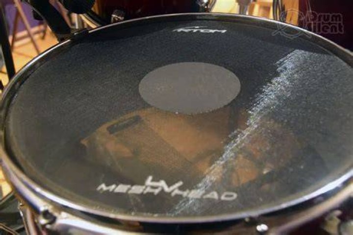 How do you put mesh drum heads on?