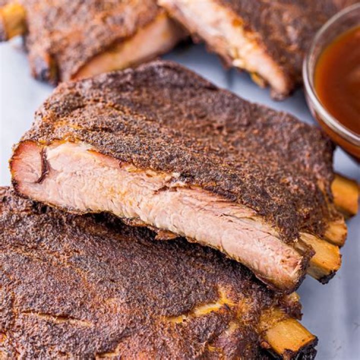 How long should a dry rub sit on ribs?