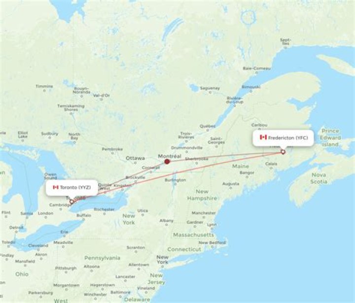 How many air miles is it from Fredericton to Toronto?